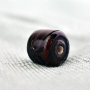 Tubular Black Glass Bead with Brown Trails